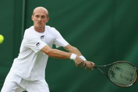 Nikolay Davydenko take a shot at Wimbledon