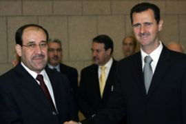 Syrian President Bashar al-Assad and Nuri al-Mailiki
