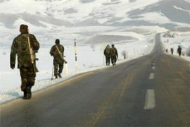 Turkish soldiers patrol border