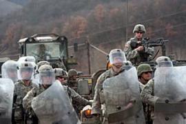 US KFOR soldiers near the small town of Leposavic, after Kosovo Serbs burned down the border crossing point