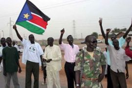 South Sudanese people cheer