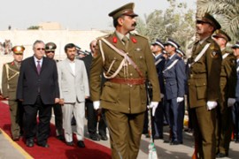 Iraq's President Jalal Talabani and Iran's President Mahmoud Ahmadinejad