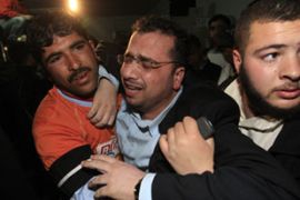 Palestinians mourn men killed in Israeli raid
