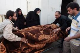 iraqi shia women mourning weeping body hospital