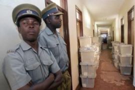 zimbabwe police officer guard ballot boxes