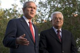 US President George W. Bush (L) gestures as he speaks with Palestinian president Mahmoud Abbas