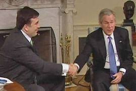 Saakashvili and Bush shake hands