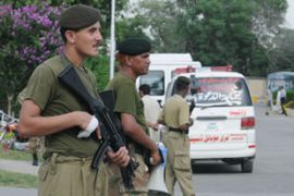 Pakistan police twin suicide attacks bombings Wah arms factory