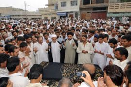 Pakistanis mourn coffin funeral Wah suicide attack bombing arms factory