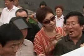 china eviction protests - video stills