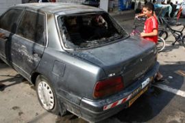 Car damaged in Acre riots