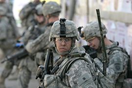US soldiers are seen during a patrol in the fashionable Karrada district of Baghdad on February 25 2009