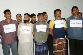 Bangladeshi police display five arrested members of the Bangladesh Rifles