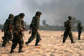 Handout photo from Sri Lankan military shows what the army says are government soldiers on a beach inside the ''No Fire Zone''