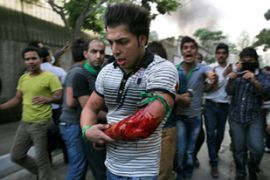 Injured man at Iran protest