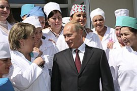 Russian Prime Minister Vladimir Putin meets with nurses at a hospital during a visit to the capital of Georgia''s breakaway Abkhazia region, Sukhumi