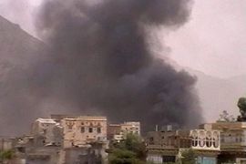 smoke rises above Yemeni village bombarded by military