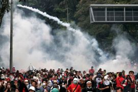 Tear gas fired at protesters in Kuala Lumpur