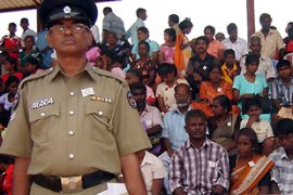 Internally displaced people wait inside a stadium in Jaffna