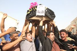 iraq twin bombings funerals