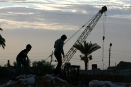 Crane building wall on Egypt-Gaza border