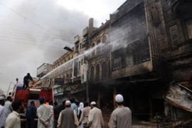 Karachi firefighters put out blaze after riots