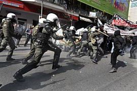 Riot police clash with demonstrators in Athens on March 11, 2010 during a 24-hour general strike to protest the government''s austerity plan to solve the country''s debt crisis.