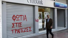 "Fire to the banks" during a rally against government''s austerity measures in Athens