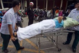 Paramedics assist in evacuating a patient from the Chulalongkorn Hospital