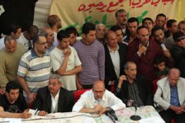 Mohamed ElBaradei (C) addresses supporters during a gathering in Mansura