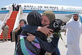 Kuwaiti Haya Al Shatti (C-R) is welcomed by a relative as 16 Kuwaiti ''Freedom Flotilla'' activists arrive in Kuwait on 02 June 2010