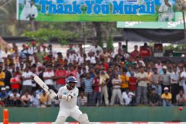 Sri Lanka''s Muttiah Muralitharan prepares to hit the ball during third day of first test cricket match against India
