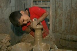 A six-year-old boy has attracted much attention in Gaza by being the youngest potter in the area.