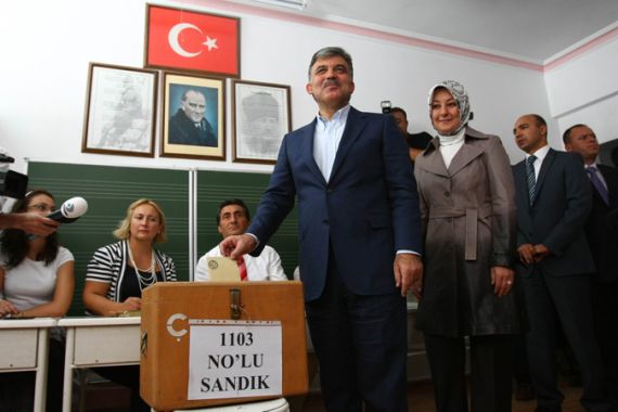 Turkey''s President Abdullah Gul casts his vote during a