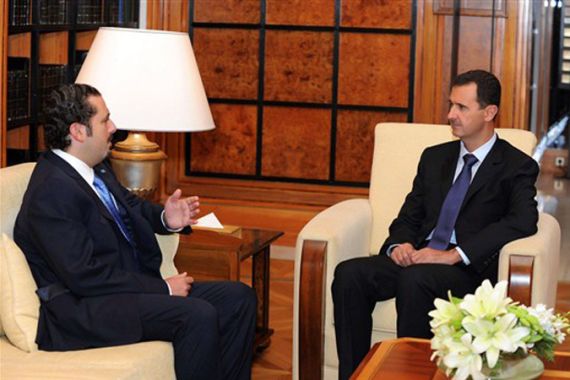 Bashar al-Assad (R) meeting with Lebanese Prime Minister Saad Hariri