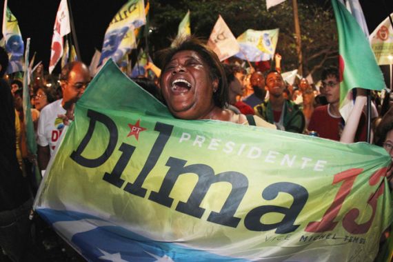 A supporter of the newly elected Brazil''s President Dilma Rousseff celebrates