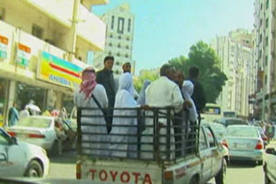 Pakistani pilgrims gather in truck to travel to Grand Mosque, Mecca, Saudi Arabia