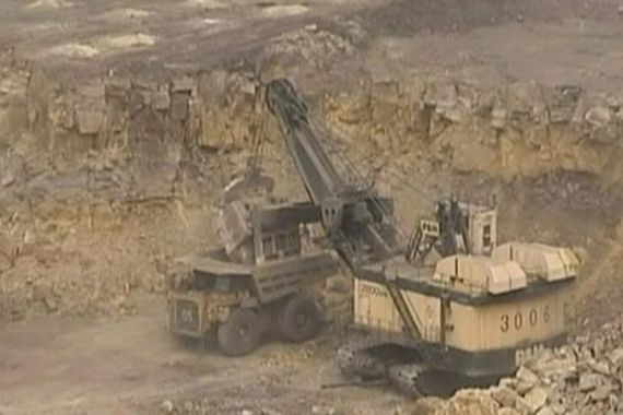 Bulldozer digging for rare elements