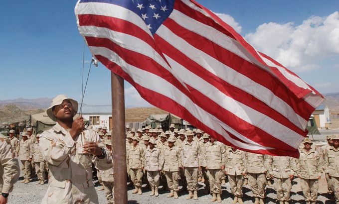 Sgt. Brandon raises the U.S. flag in Afghanistan
