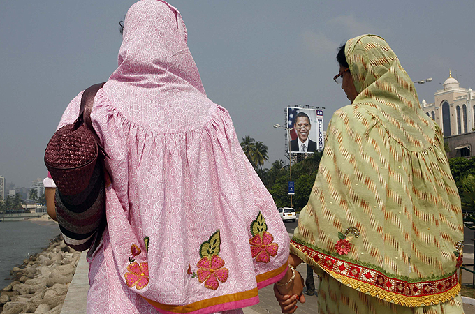 Two women walking in Mumbai