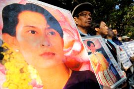 Supporters of Myanmar''s detained opposition leader Aung San Suu Kyi demonstrating