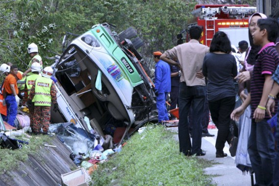 Rescuers at Malaysia crash