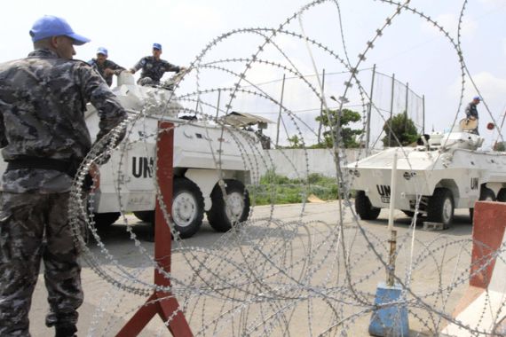 U.N. security forces are seen deployed around U.N. headquarters in Abidjan