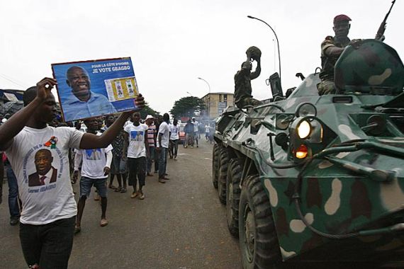 Supports of Ivory Coast President Laurent Gbagbo, attend a rally prior to run off elections, Abidjan, Ivory Coast, 22 November 2010.