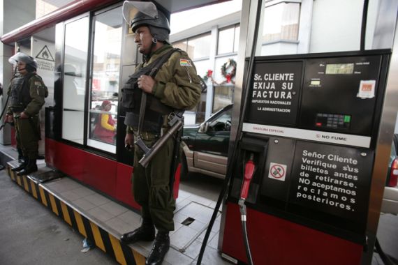 Bolivian police at petrol station