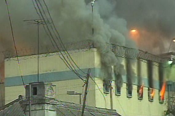 In this still image taken from video shows a fire at San Miguel public prison in Santiago