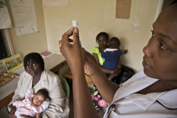 Save the Children - Nurse preparing vaccine