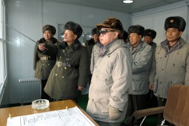 Kim Jong-il watching military training