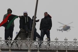 Inside Story - Anti Gaddafi Protestors Demonstrate On The Rooftop Of The Libyan Embassy (goes with no-fly zone episode)