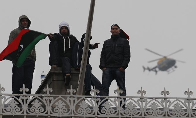 Inside Story - Anti Gaddafi Protestors Demonstrate On The Rooftop Of The Libyan Embassy (goes with no-fly zone episode)